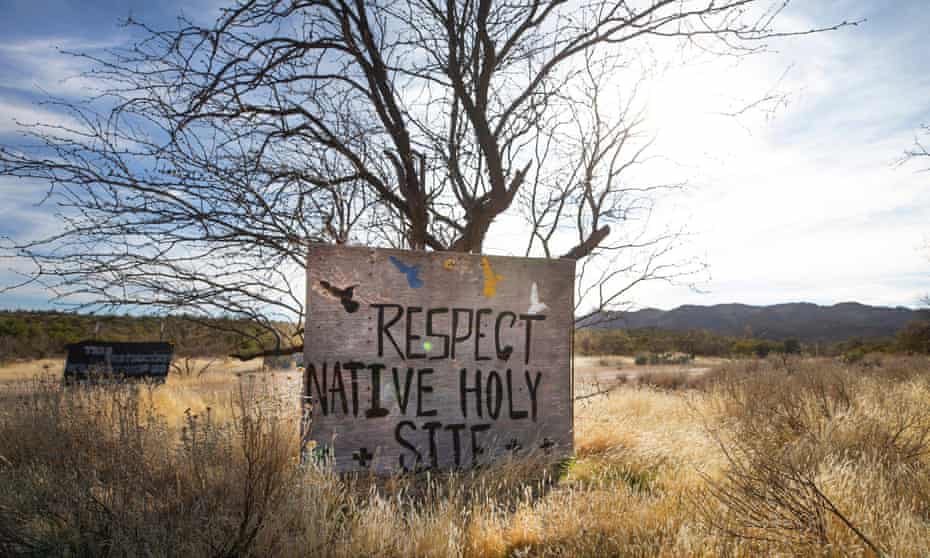 Signs posted at Oak Flat protest the possibility of the federal government clearing the way for a copper mine. Oak Flat sits atop one of the largest untapped copper deposits in the world, estimated to be worth more than $1bn. 