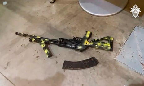 A Kalashnikov assault rifle lies on the ground 