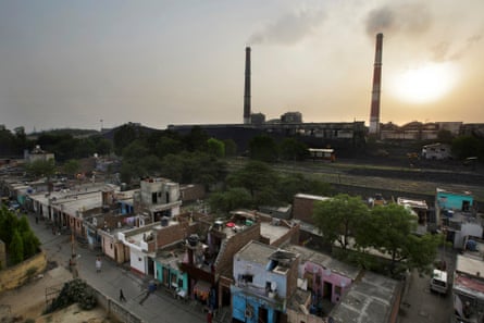 A coal-fired power plant near residential property in Badarpur, Delhi, India