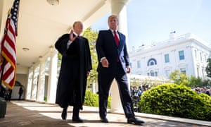 Anthony Kennedy, the retiring supreme court justice, with Donald Trump in the White House rose garden