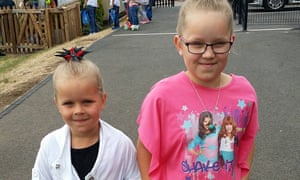 Katrina (L) and Karlina Raiba, aged five and eight, who were left paralysed after Andrew Nay smashed his company 4x4 into their father’s car during a road rage chase.