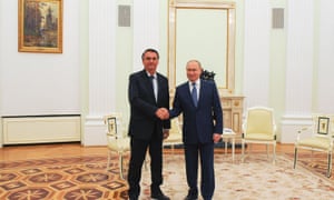 RUSSIA-BRAZIL-POLITICS-DIPLOMACYRussian President Vladimir Putin (R) shakes hands with Brazil’s President Jair Bolsonaro during a meeting at the Kremlin, in Moscow, on February 16, 2022. (Photo by Mikhail Klimentyev / Sputnik / AFP) (Photo by MIKHAIL KLIMENTYEV/Sputnik/AFP via Getty Images)