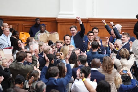 Conservative supporters celebrate in a crowded hall after the party took Westminster city council from Labour.