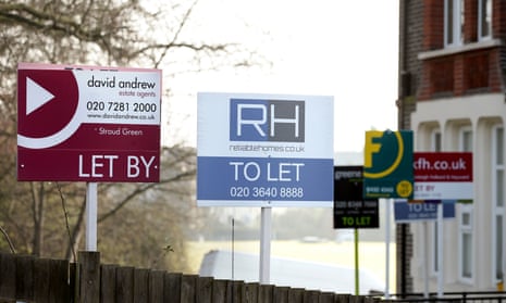 estate agent signs placed outside homes