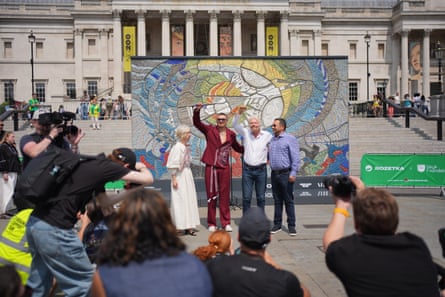Oleksandr Usyk and Sir Richard Branson, with Vladyslav Chechotkin (right) and deputy mayor for culture and the creative industries, Justine Simons, unveil the Kestrel Mosaic.