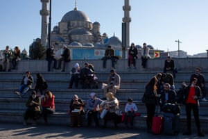 People who had to eat on the street due to the closure of restaurants and cafes on Eminonu square in Istanbul, Turkey on 30 December, 2020.