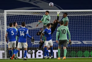 Robin Olsen receives a bang on the head as he attempts to clear the ball.