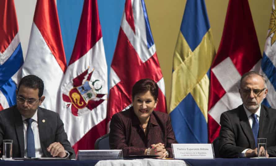 Guatemala’s attorney general Thelma Aldana, is flanked by Iván Velásquez, commissioner of the Cicig, right, and the Guatemalan president, Jimmy Morales, in Guatemala City in 2016.