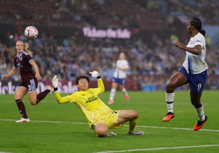 Khadija Shaw scores Manchester City’s third goal in their 4-1 win at Villa Park.