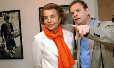 Liliane Bettencourt with François-Marie Banier in 2004, who was convicted of exploiting her in 2015.