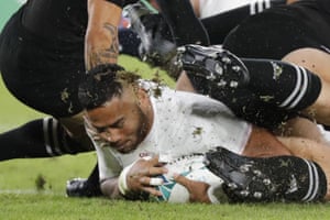 England’s Manu Tuilagi scores a try.
