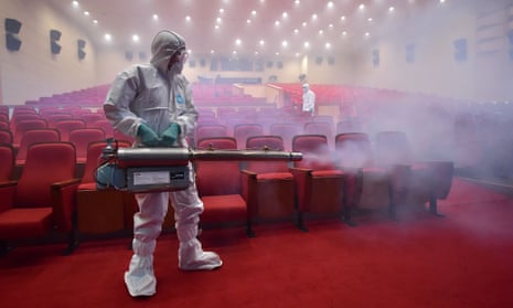 A worker fumigates a cinema in Seoul, South Korea, during the Mers outbreak in 2015