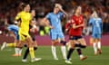 The England captain, Millie Bright, is disconsolate at the final whistle as Spain celebrate