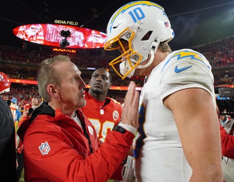 Kansas City Chiefs defensive coordinator Steve Spagnuolo offer words of encouragement to Los Angeles Chargers quarterback Justin Herbert after Sunday’s game.
