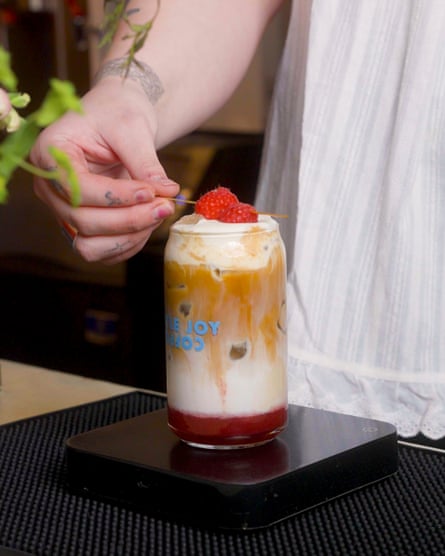 a glass with a coffee beverage