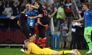 Luka Modric celebrates after Croatia beat England to seal their first ever World Cup final appearance.