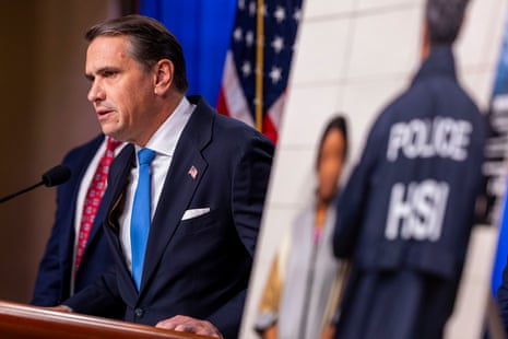 Man leans forward while speaking into a microphone next to an image showing a federal agent and a detained person
