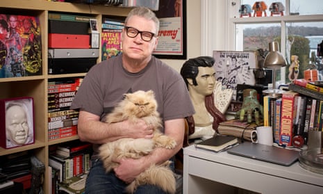 Mark Kermode and his cat Harry in his office at home.