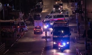 Police convoy vehicles in Hong Kong.