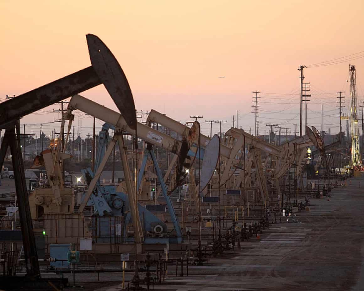 Oil rig pumpjacks extract crude from the Wilmington Field oil deposits area, near Long Beach, California.