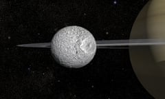Mimas in orbit around Saturn