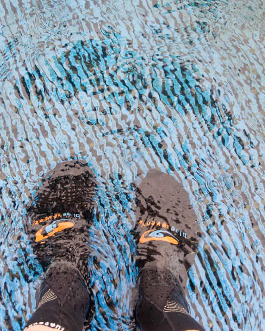 A pair of feet wearing insulated socks