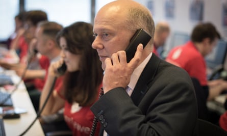 Chris Grayling on the phone to voters at the launch of the Vote Leave campaign.