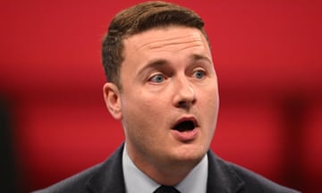 Wes Streeting against a red background