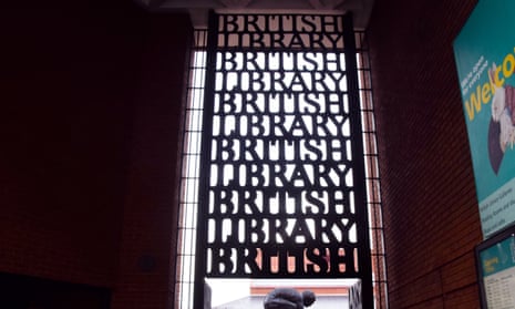 doorway at London site showing light shining through from courtyard behind repeated lettering reading 'British Library'