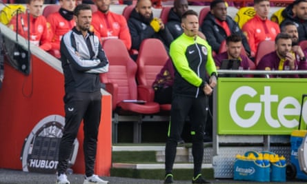 Newcastle's assistant manager Jason Tindall near fourth official Steve Martin at Brentford this month.