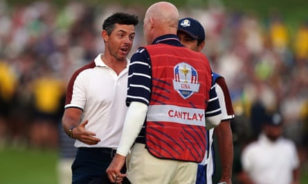 Rory McIlroy exchanges words with Joe LaCava, the caddie of Patrick Cantlay