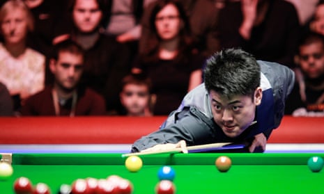 Liang Wenbo plays a shot in the final of the English Open.