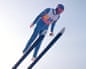 Eddie “The Eagle” Edwards flying through the air on skis