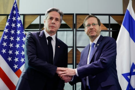 US secretary of state Antony Blinken, left, meets Israel's president Isaac Herzog in Tel Aviv.