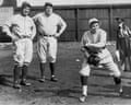 Lou Gehrig and Babe Ruth look on as Jackie Mitchell, one of the first women to play professional baseball, practices her form.