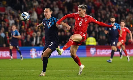 Wales' Harry Wilson scores their side's first goal.