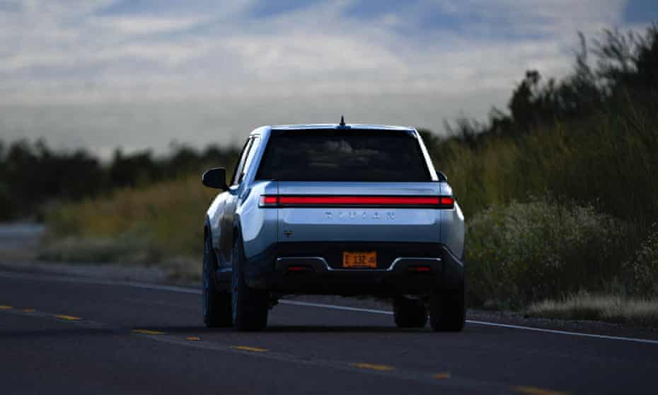 A Rivian vehicle on an open road