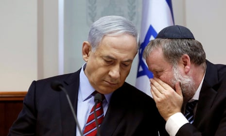 Avichai Mandelblit talks into Benjamin Netanyahu ear