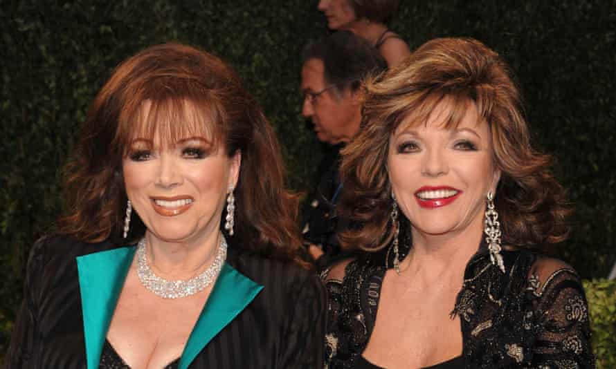 With sister Joan Collins in 2009.