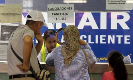 A cancellation notice greets passengers at the Ryanair desk at Barcelona’s El Prat airport during a cabin crew strike.