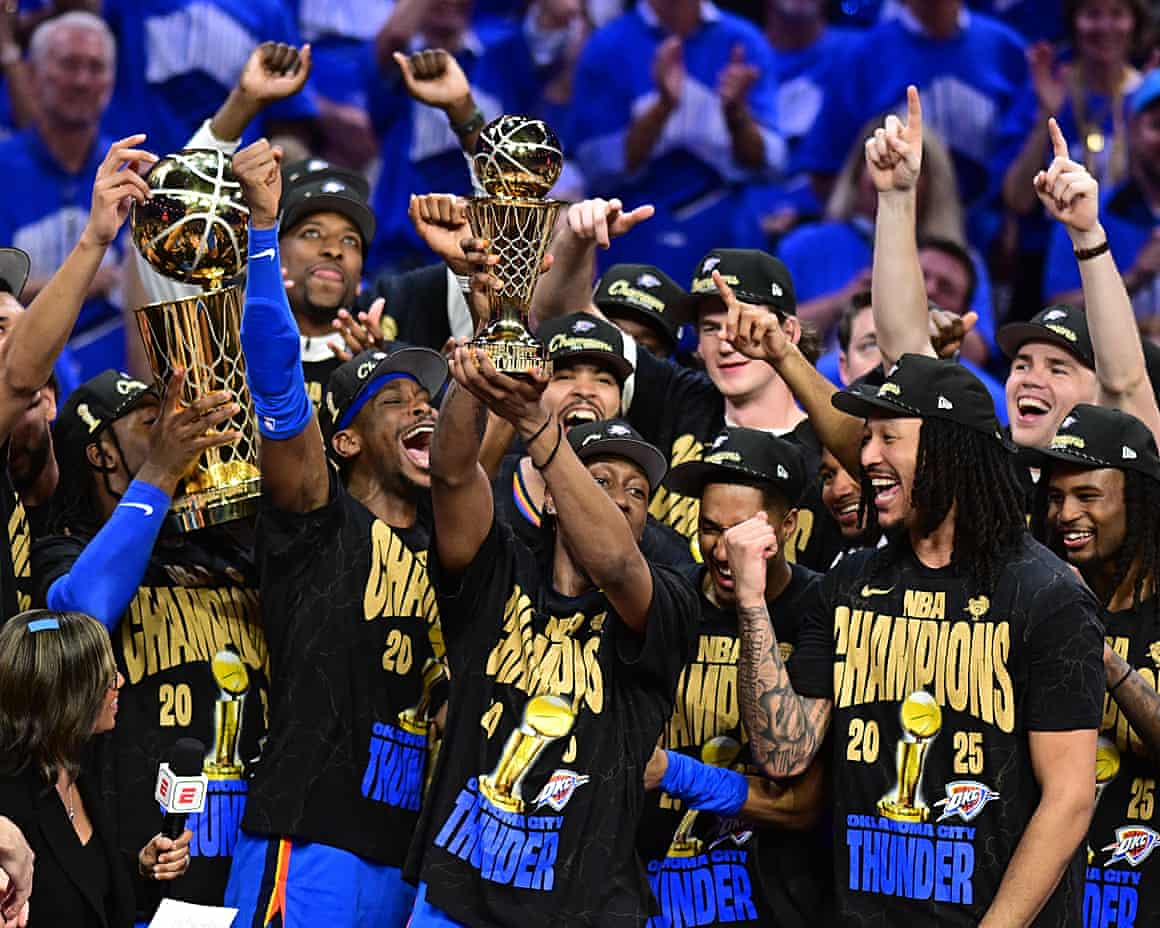 basketball players with a trophy