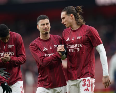 Gabriel Martinelli and Riccardo Calafiori of Arsenal warming up