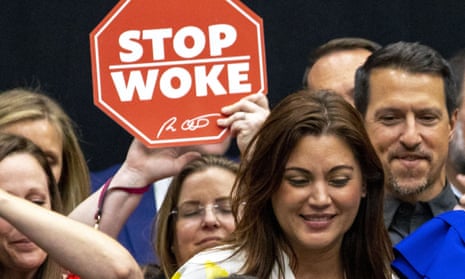 sign says 'stop woke'