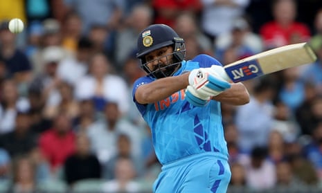 India's Rohit Sharma gives the ball a thwack.