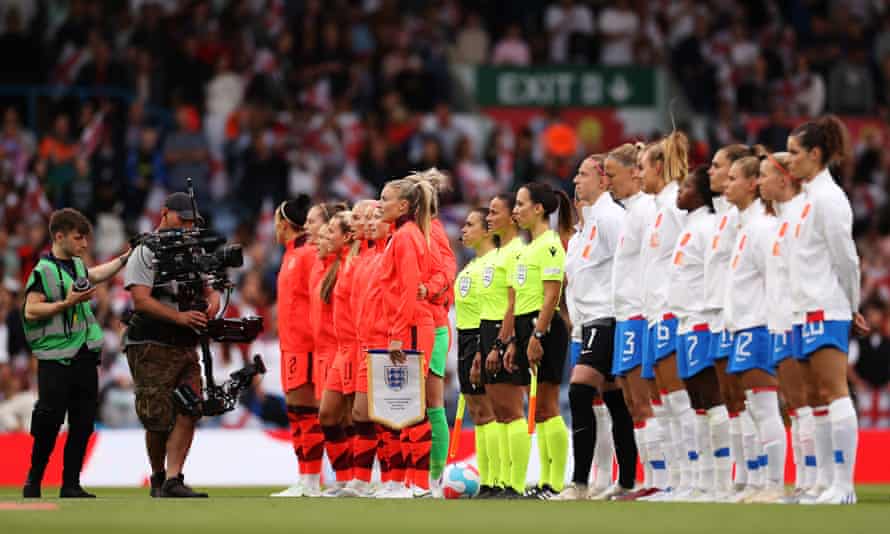 England and the Netherlands are lining up to hear the national anthem.