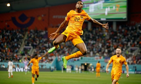 Netherlands' Denzel Dumfries celebrates scoring their third goal