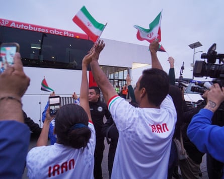 A small group of fans gathers at Tijuana airport to cheer the team