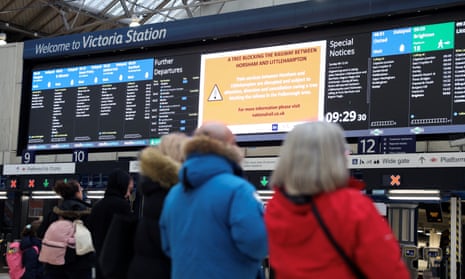 Passengers at Victoria Station on Sunday.