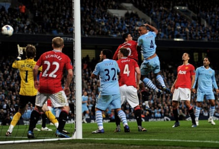 Vincent Kompany scores for Manchester City against Manchester United in April 2012.