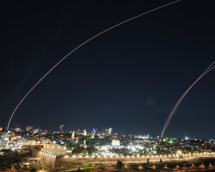 Night sky over Jerusalem with arcs of light